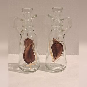 Anchor hocking cruet set.  Brown leaves with a gold border.